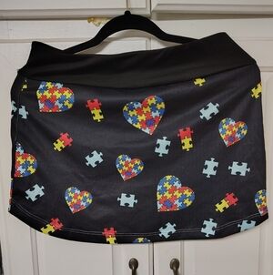 AUTISM AWARENESS Black Skort with Puzzle Piece Heart Print